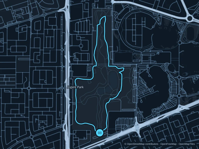 Mapa de la ruta de 4,0 km por Aspire Park · caminos para correr, con salida y llegada señaladas con 03.